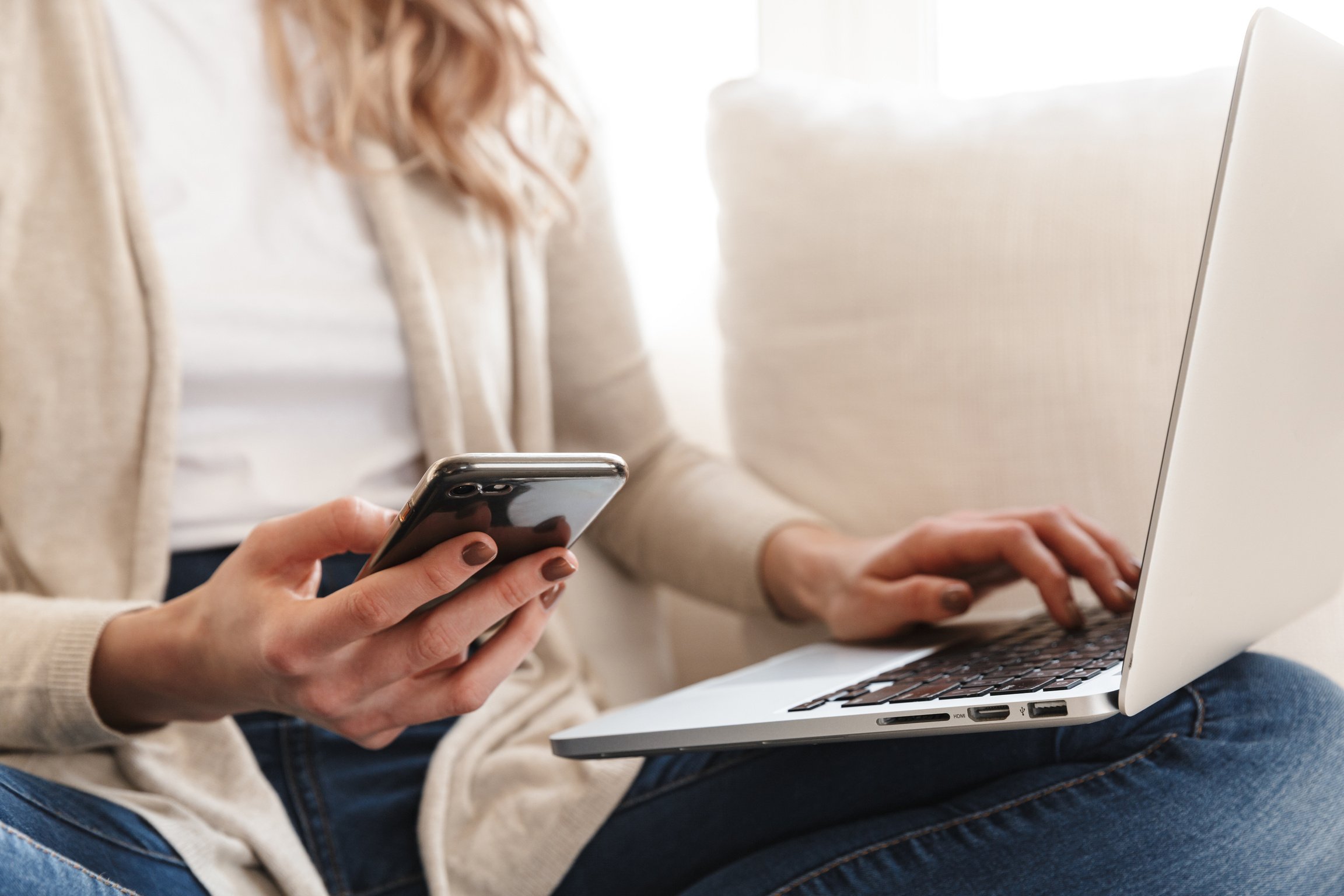 Woman Browsing Her Laptop 